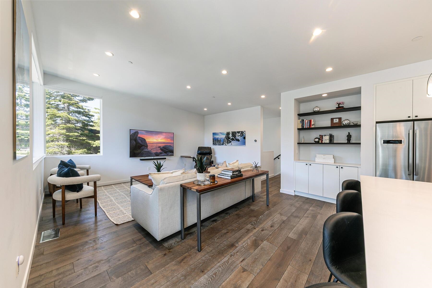 260 Palisades Circle Olympic Valley, CA 96146 - Photo 3 of 28 a living room with furniture and a flat screen tv