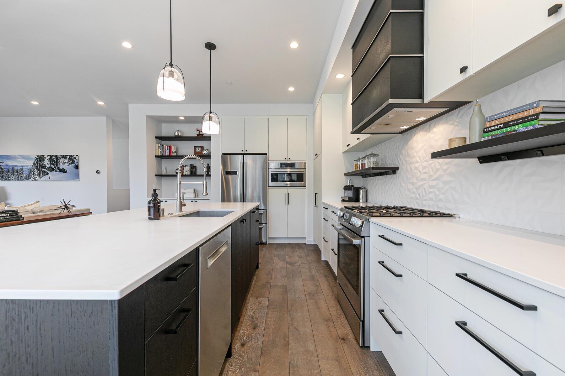 260 Palisades Circle Olympic Valley, CA 96146 - Photo 6 of 28 a kitchen with stainless steel appliances sink stove and cabinets
