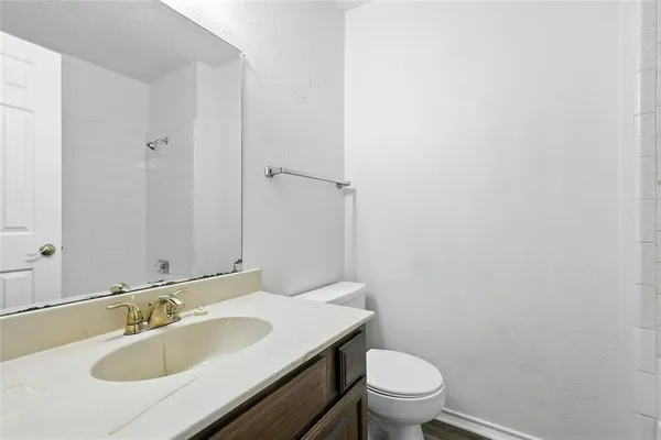 a bathroom with a sink and a toilet