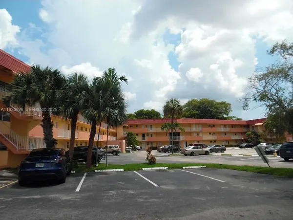 a view of street with parked cars
