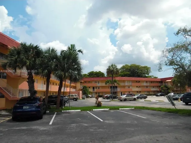 a view of street with parked cars