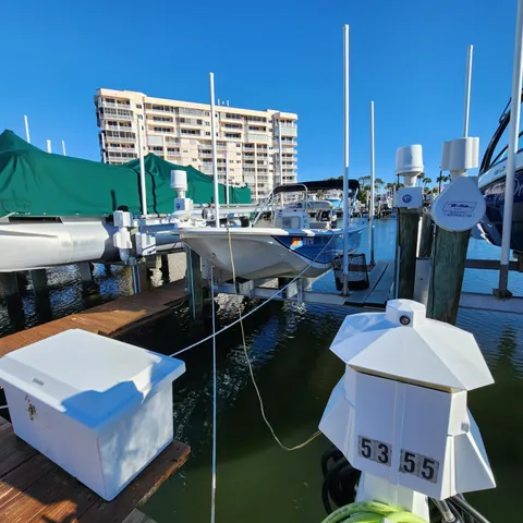 a view of an outside dining space with seating area