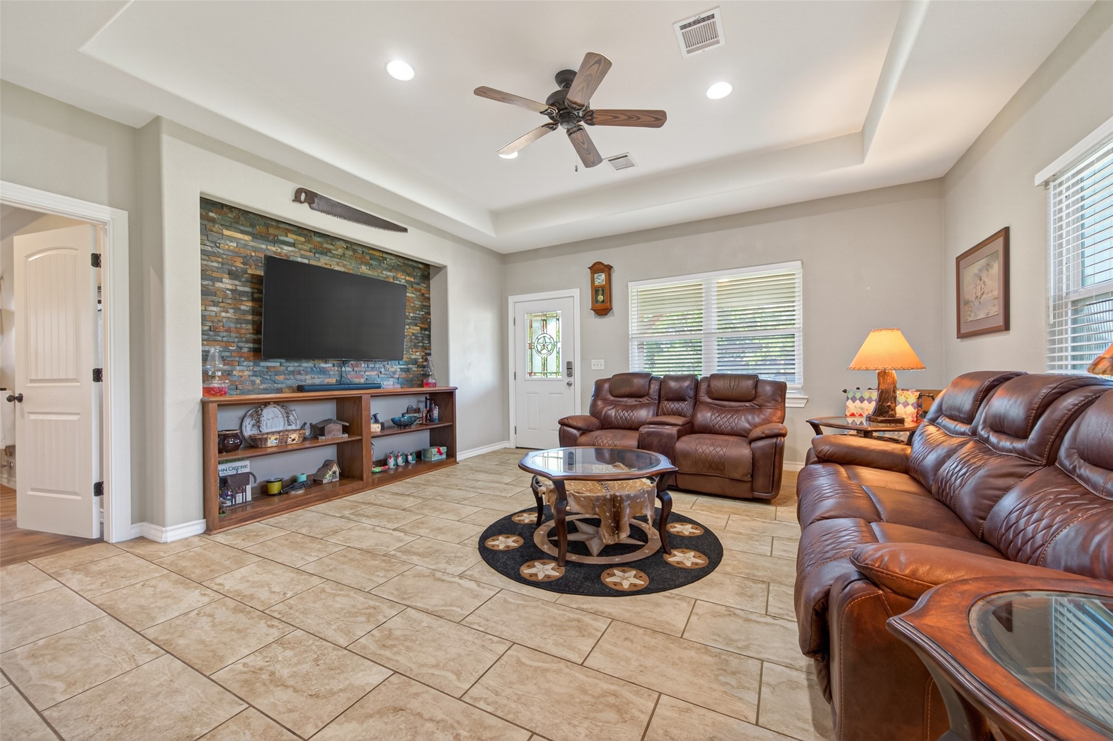 2240 Meyer Road Beasley, TX 77417 - Photo 7 of 29 Large, open living room with tray ceiling and custom tv built-in