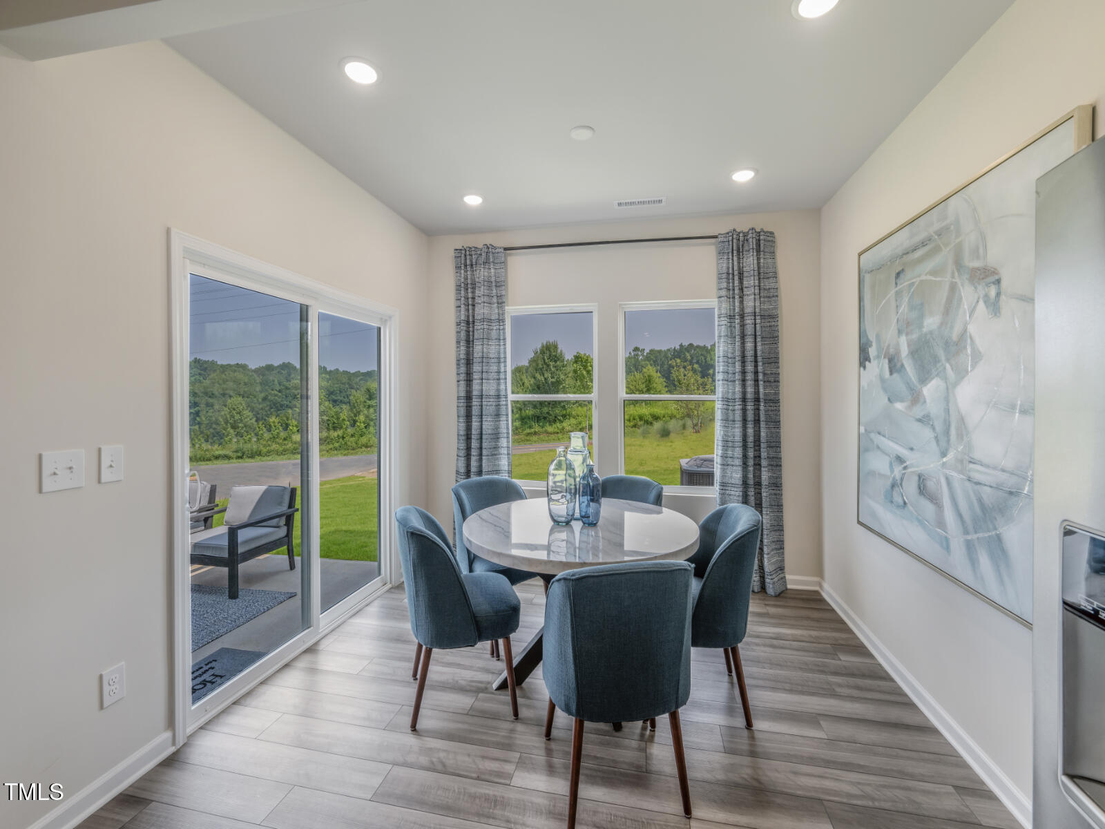 833 Ottawa Drive Garner, NC 27529 - Photo 6 of 13 a dining room with furniture window wooden floor