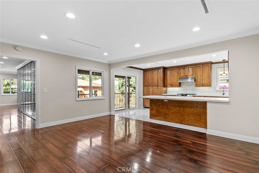 415 Birmingham Road Burbank, CA 91504 - Photo 16 of 61 a room with stainless steel appliances kitchen island wooden floors and view living room