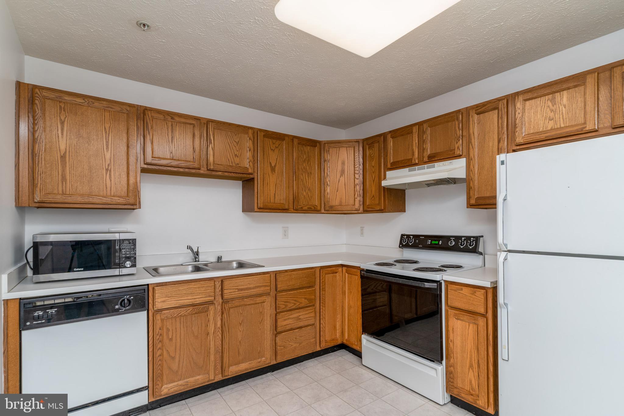 2442 Blue Spring Court, Unit 204 Odenton, MD 21113 - Photo 27 of 43 Kitchen (when empty)