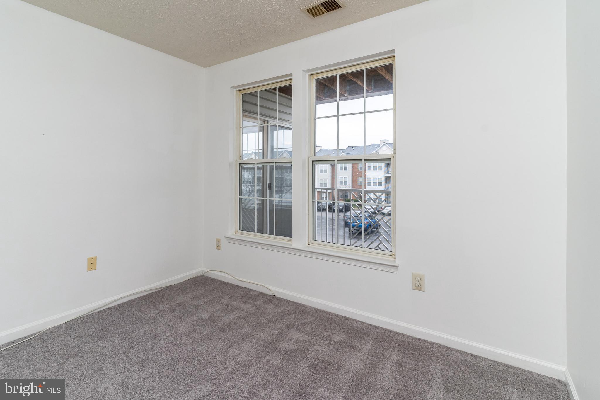 2442 Blue Spring Court, Unit 204 Odenton, MD 21113 - Photo 36 of 43 Bedroom 2 (when empty)