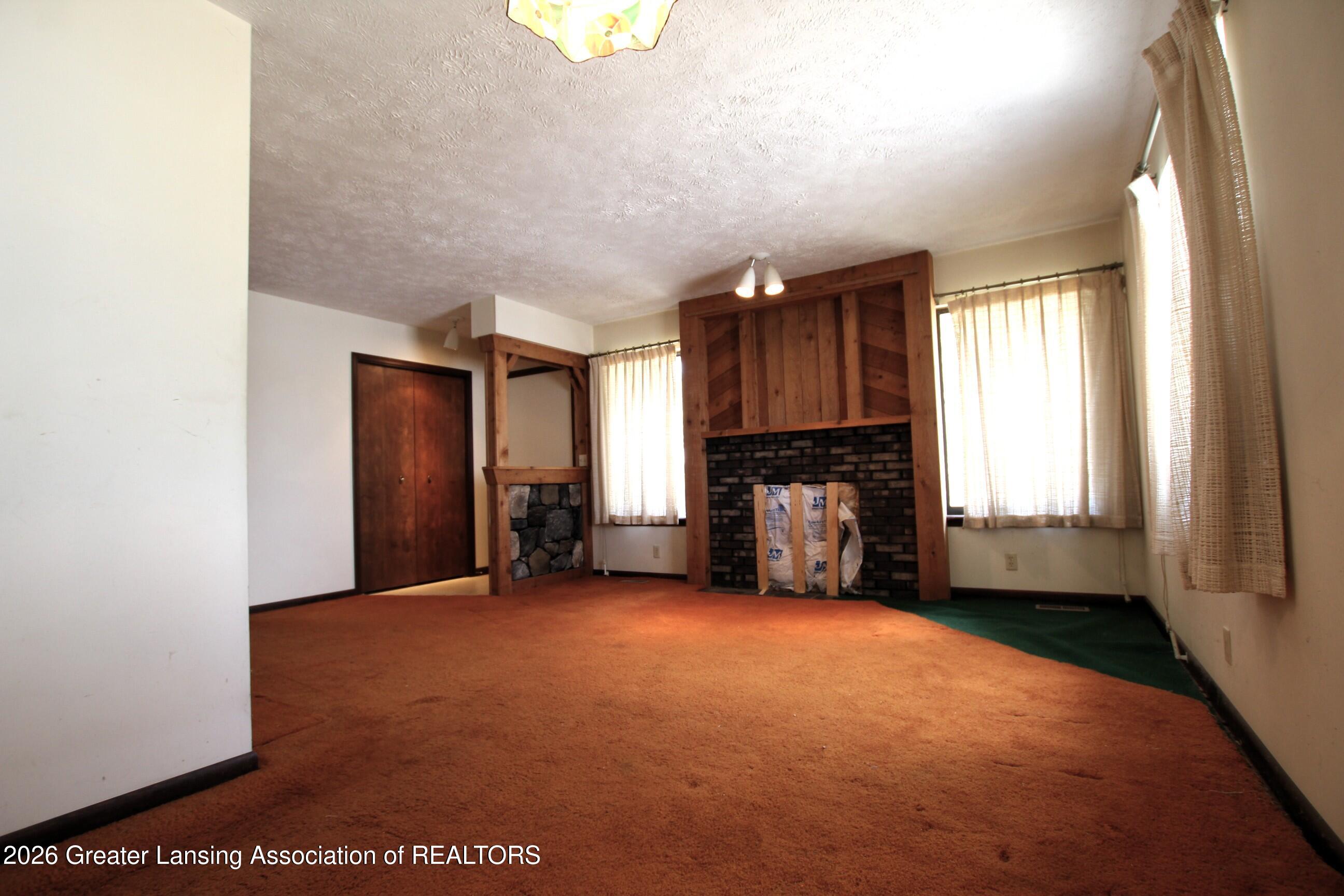 8635 West Herbison Road Eagle, MI 48822 - Photo 12 of 49 Living Room