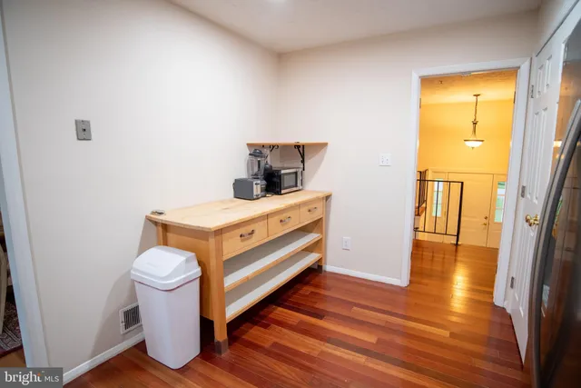 a bathroom with a sink and a shower