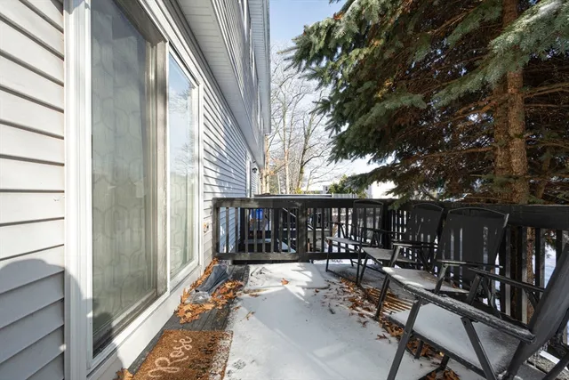 a view of balcony with furniture