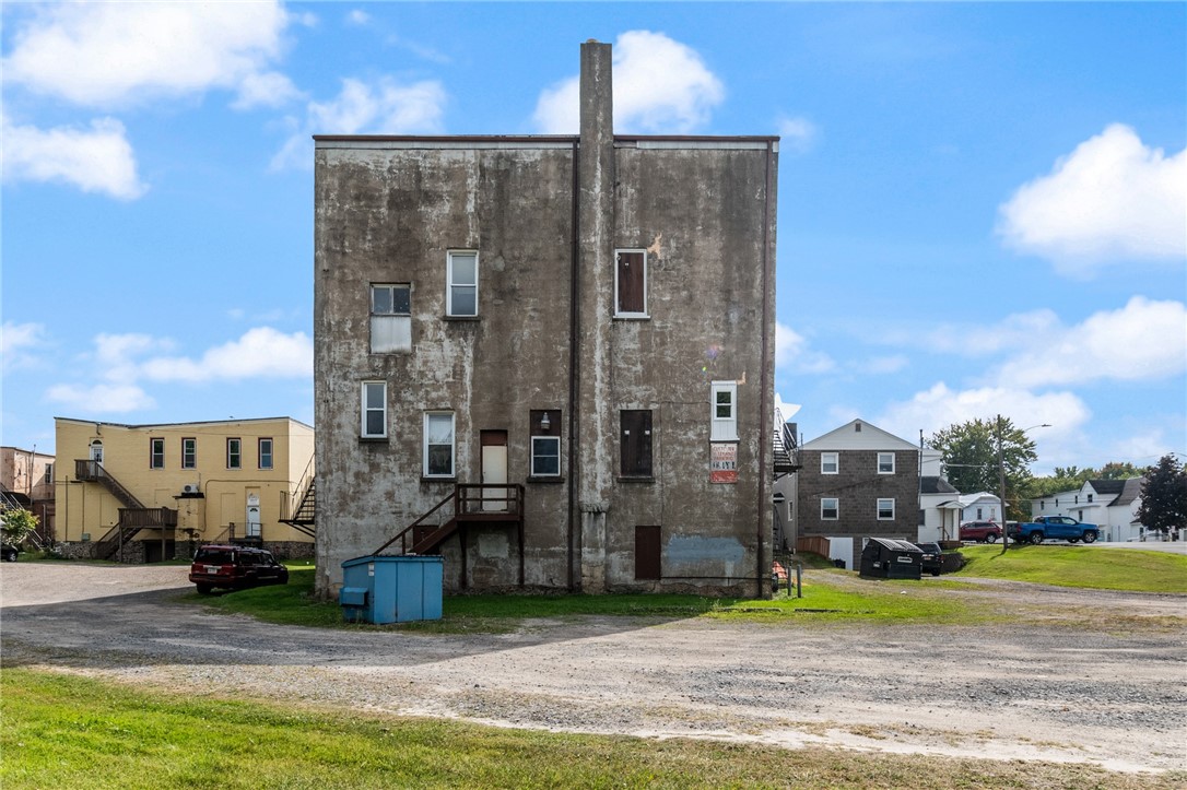 4075 Ridge Road Williamson, NY 14589 - Photo 32 of 37 A view of the rear - plenty of parking!