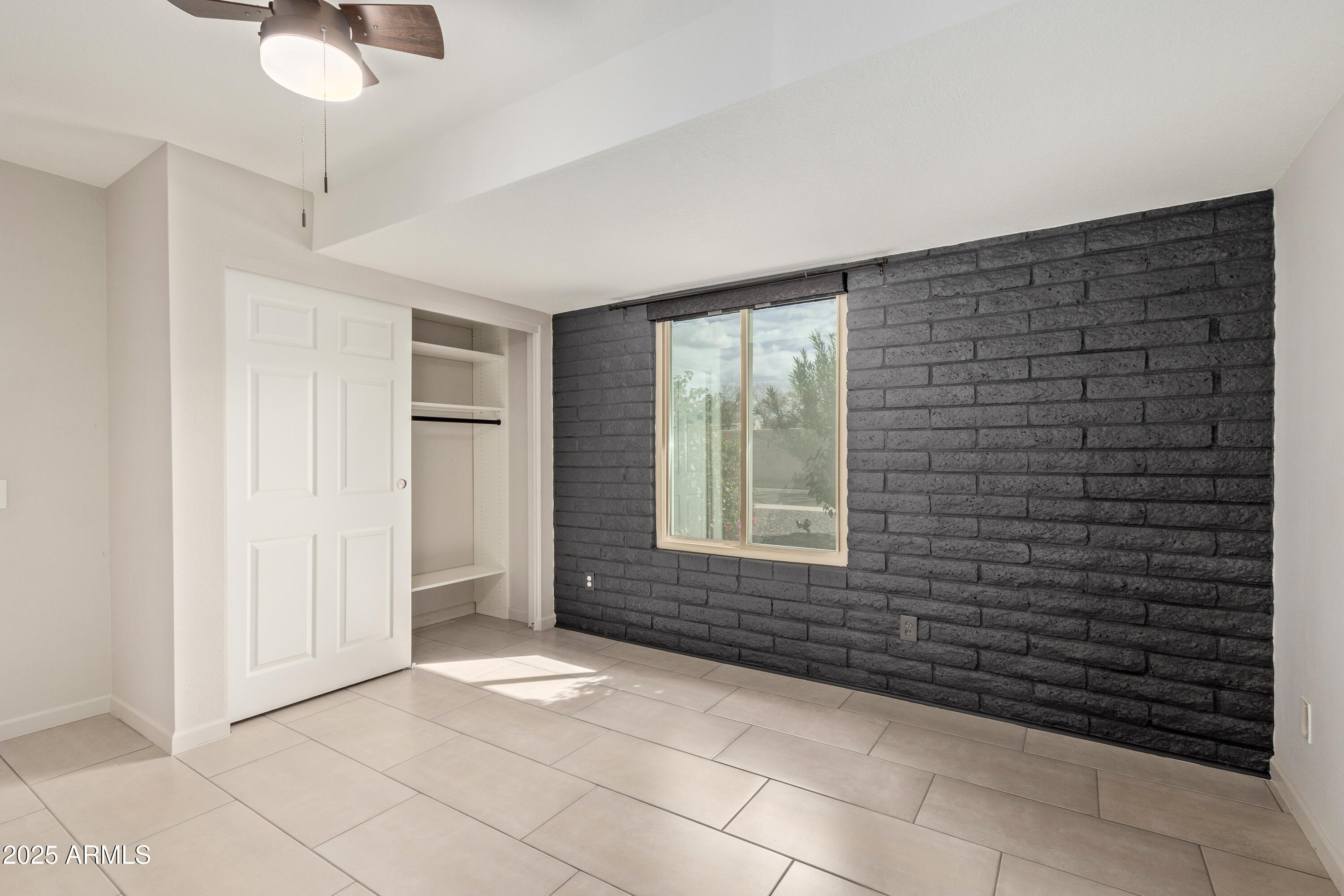 302 West Thunderbird Road Phoenix, AZ 85023 - Photo 25 of 44 a view of an empty room with a window