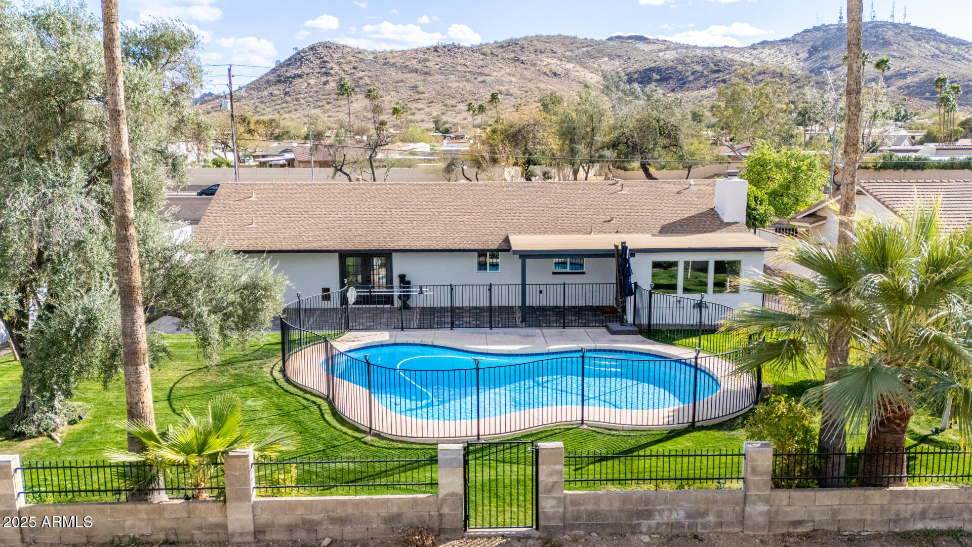 302 West Thunderbird Road Phoenix, AZ 85023 - Photo 2 of 44 aerial view of a house with swimming pool and porch