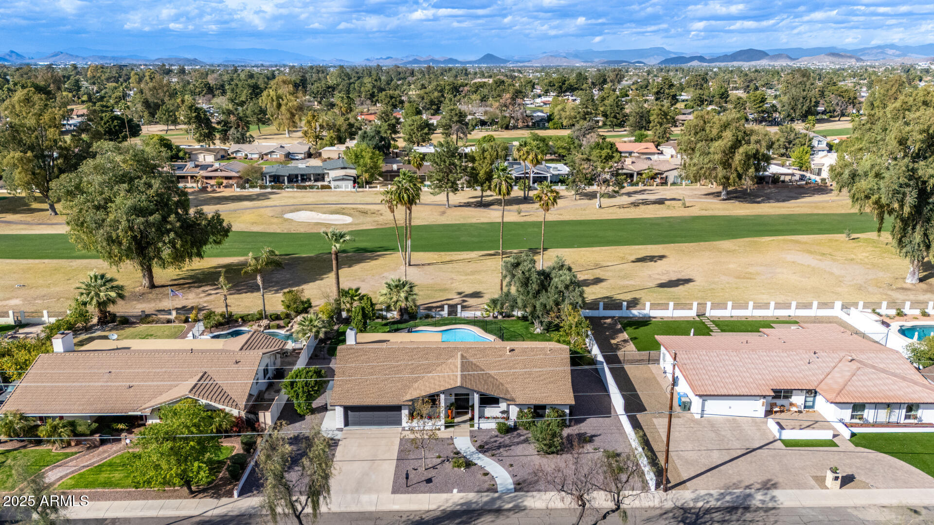 302 West Thunderbird Road Phoenix, AZ 85023 - Photo 40 of 44 an aerial view of a house with a garden and lake view