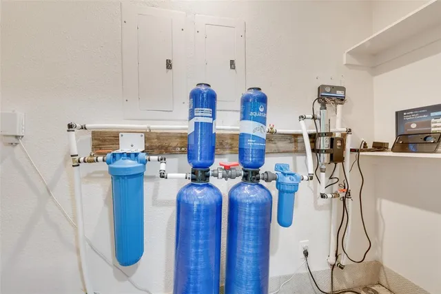 a very nice looking room with a kitchen area