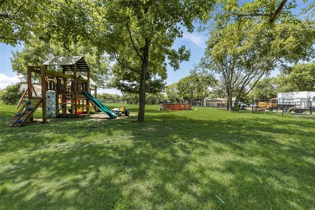 a view of a park with a slide