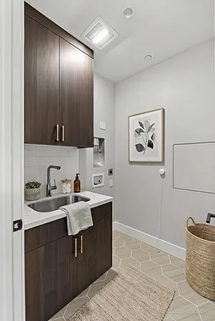 a workspace with furniture and mirror