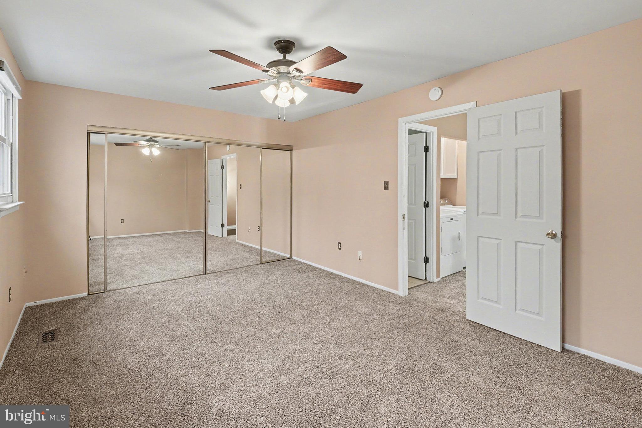 1280 Fox Run Reading, PA 19606 - Photo 13 of 23 an empty room with closet and a chandelier fan