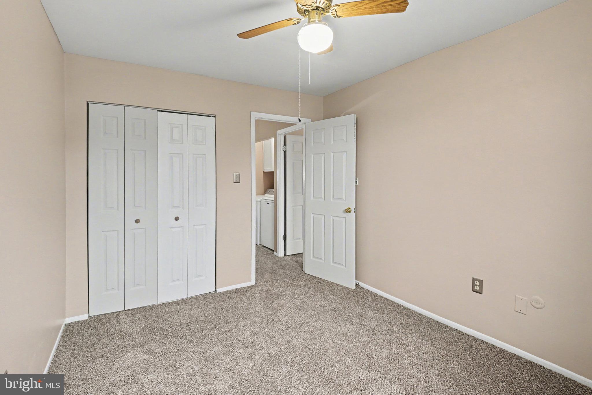 1280 Fox Run Reading, PA 19606 - Photo 17 of 23 an empty room with a chandelier fan and closet
