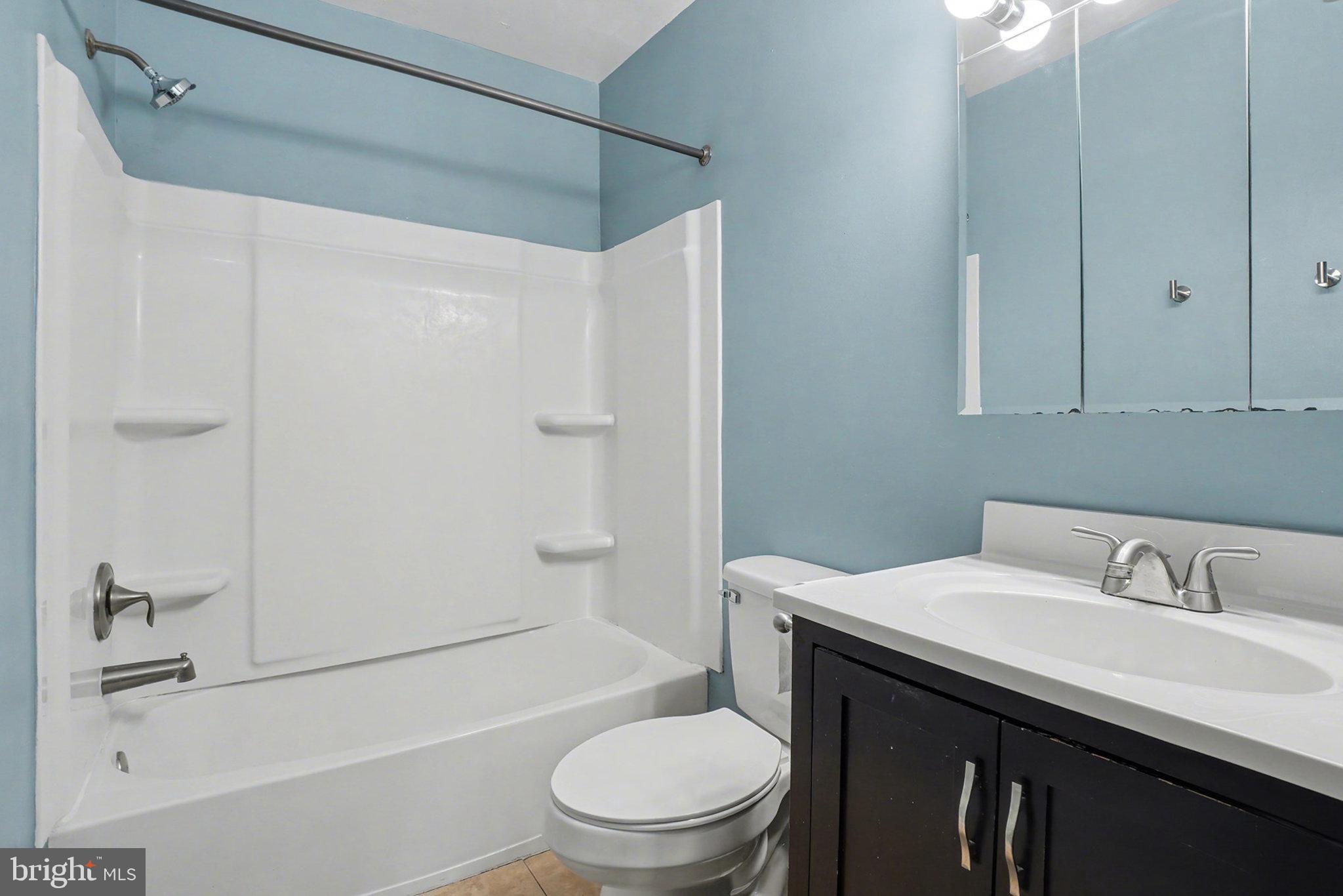 1280 Fox Run Reading, PA 19606 - Photo 18 of 23 a bathroom with a sink a toilet and shower