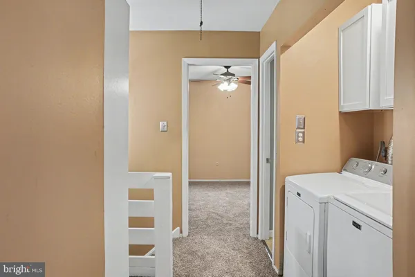 a view of entryway with bathroom