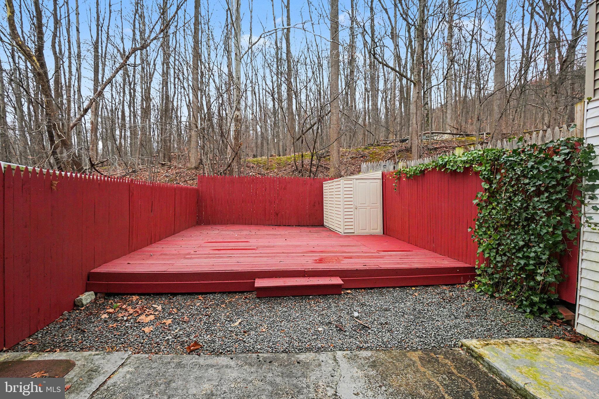 1280 Fox Run Reading, PA 19606 - Photo 23 of 23 a wooden bench sitting in front of a building