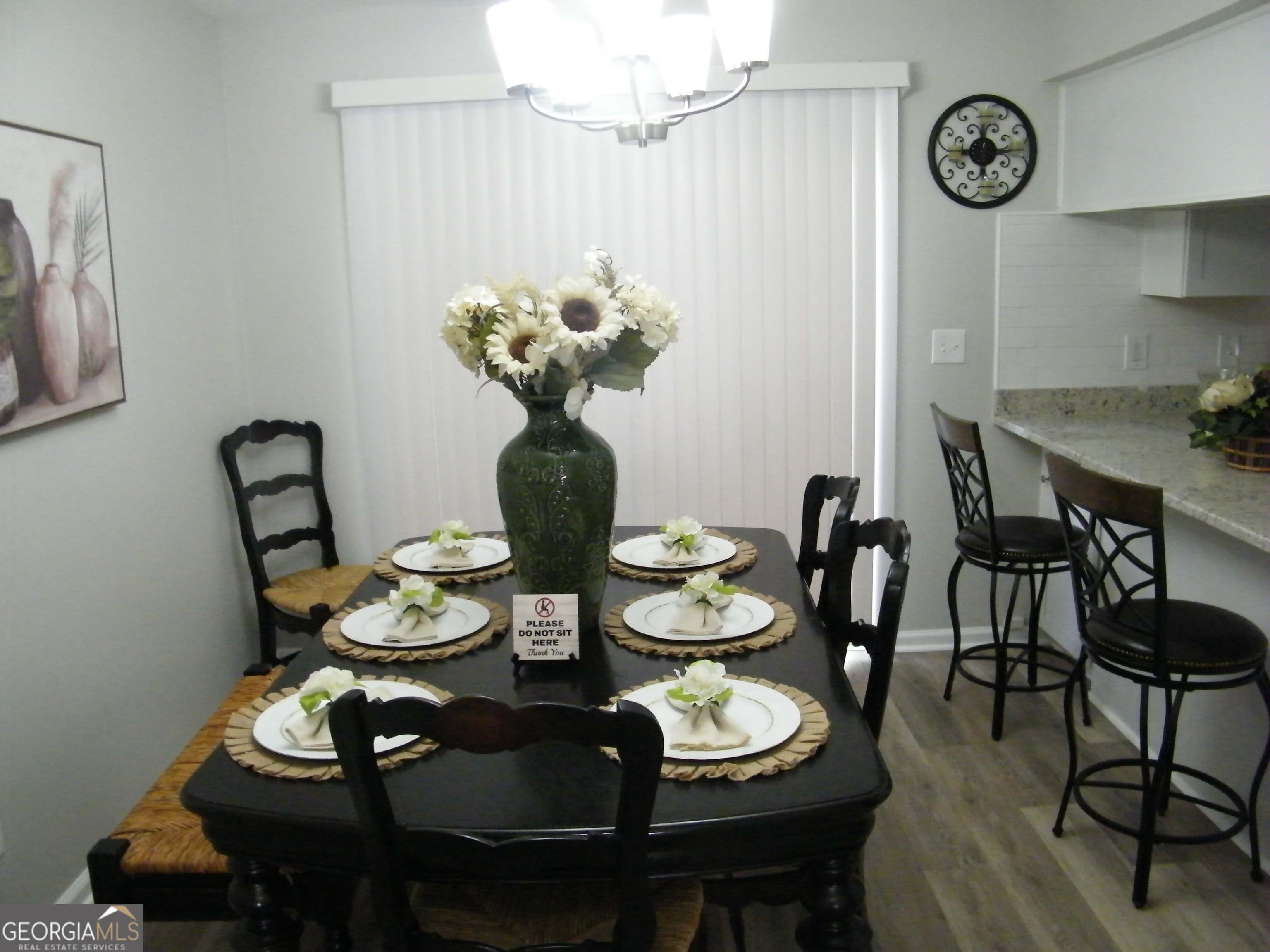 3281 Abbeywood Drive Decatur, GA 30034 - Photo 12 of 28 a view of a dining room with furniture and wooden floor