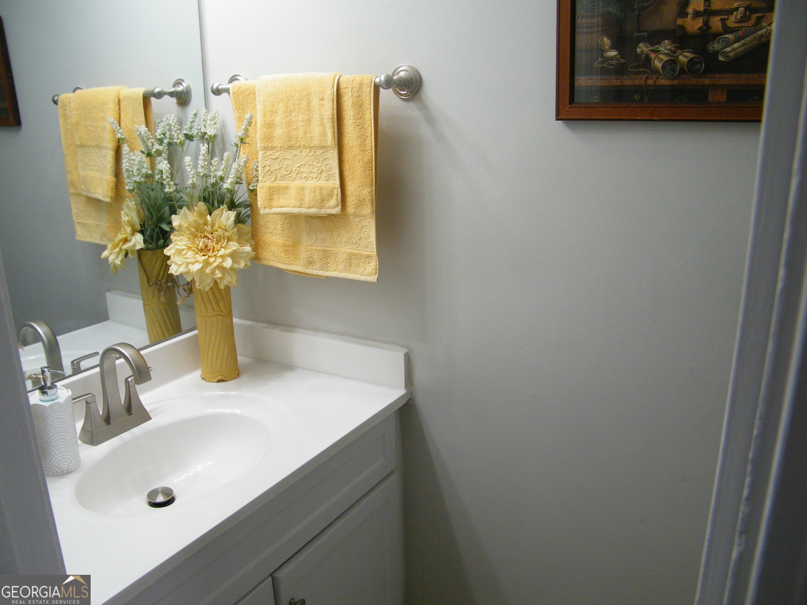 3281 Abbeywood Drive Decatur, GA 30034 - Photo 15 of 28 a bathroom with a sink and a mirror