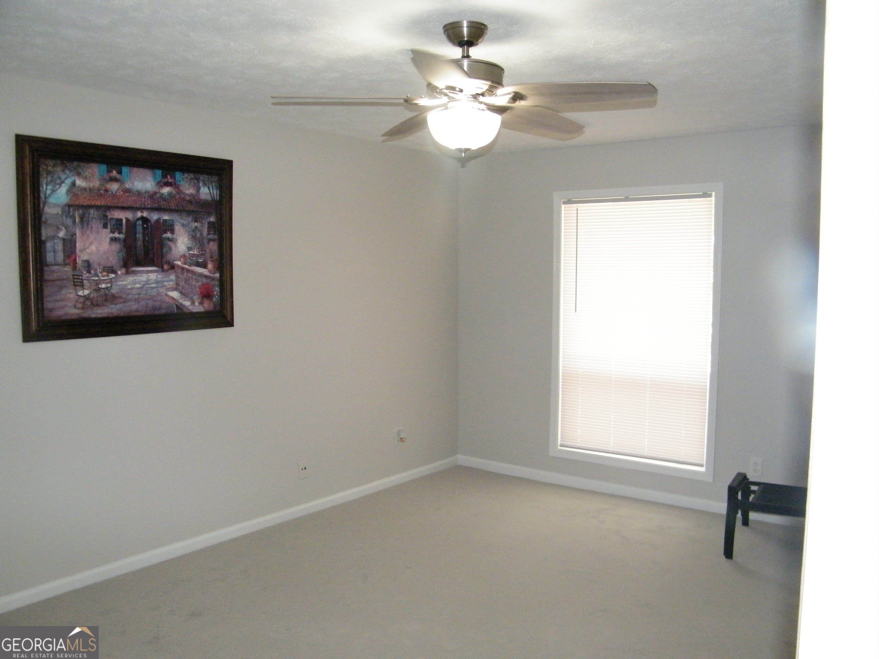 3281 Abbeywood Drive Decatur, GA 30034 - Photo 17 of 28 an empty room with a window and a fan
