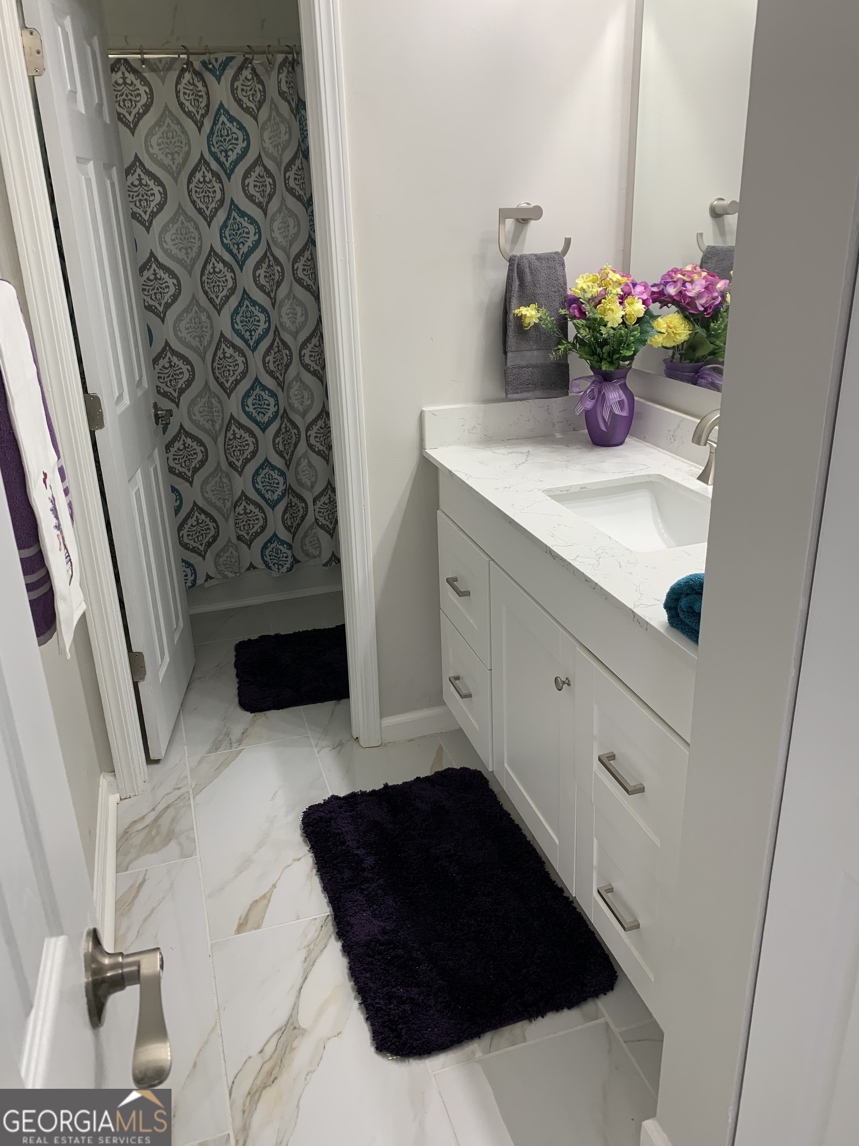 3281 Abbeywood Drive Decatur, GA 30034 - Photo 21 of 28 a bathroom with a sink and a mirror