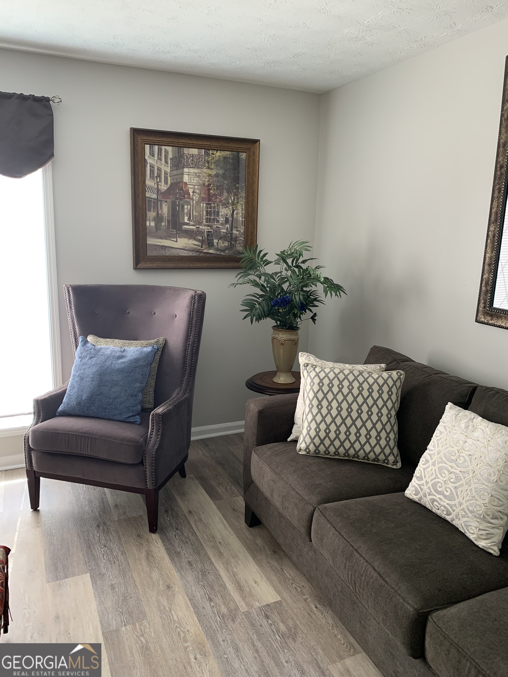 3281 Abbeywood Drive Decatur, GA 30034 - Photo 3 of 28 a living room with furniture and a potted plant