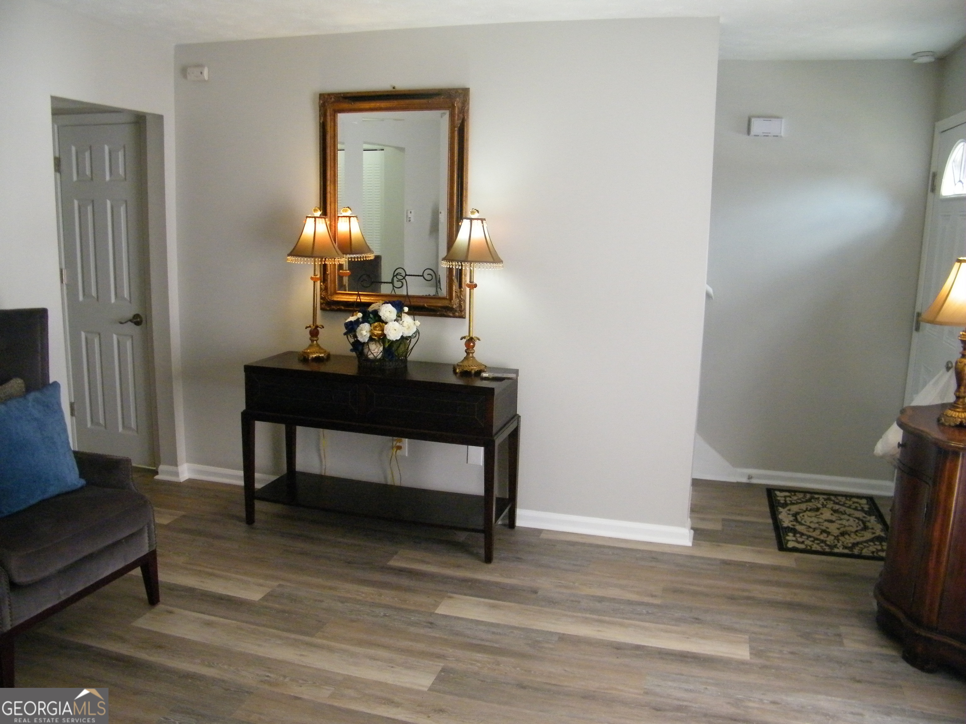 3281 Abbeywood Drive Decatur, GA 30034 - Photo 5 of 28 a living room with furniture and a wooden floor