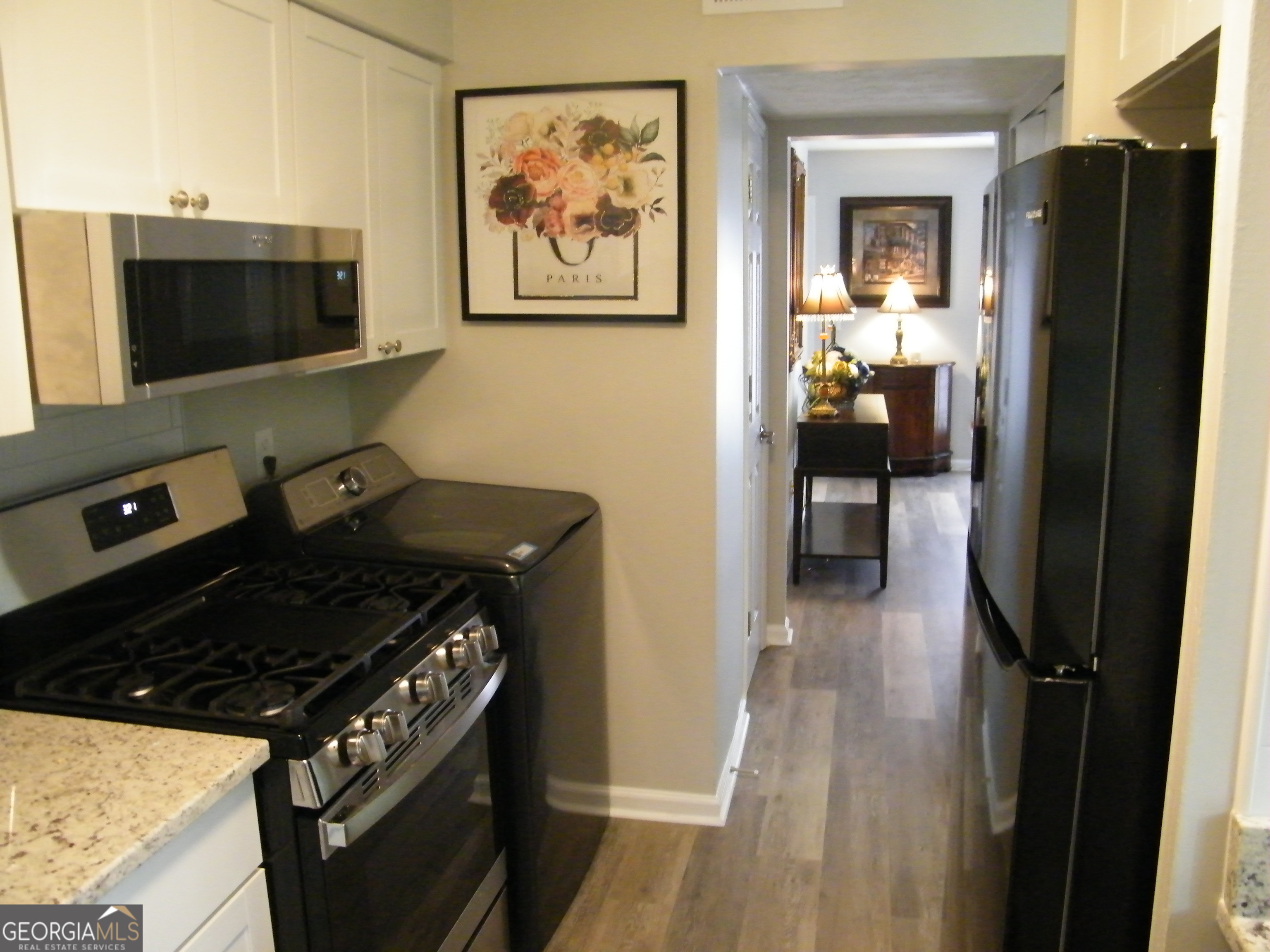 3281 Abbeywood Drive Decatur, GA 30034 - Photo 6 of 28 a kitchen with a stove and a refrigerator