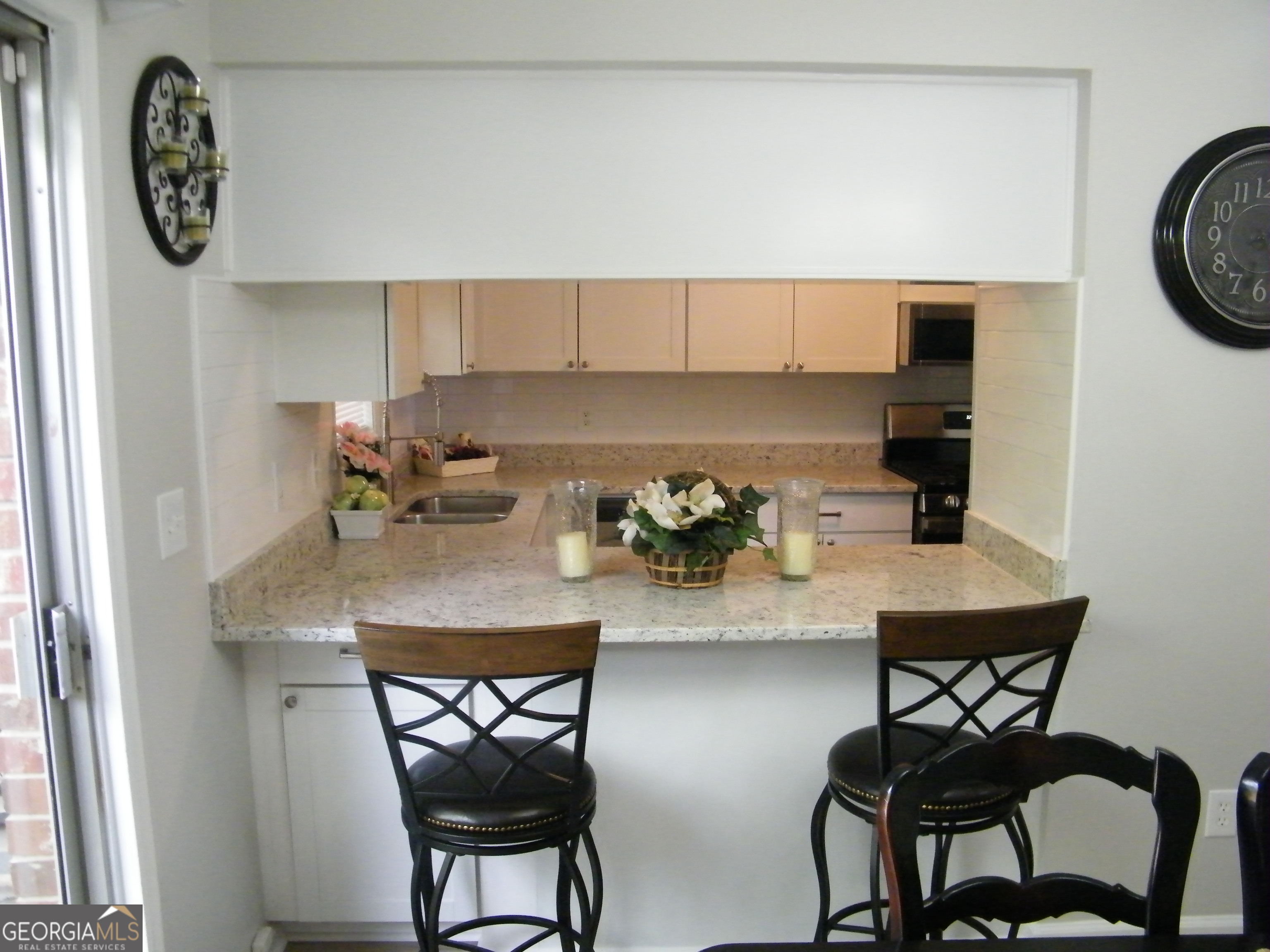 3281 Abbeywood Drive Decatur, GA 30034 - Photo 10 of 28 a kitchen with a table and chairs