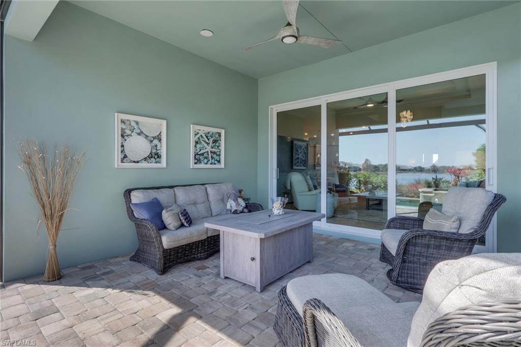 5752 Elbow Avenue Naples, FL 34113 - Photo 25 of 38 View of patio / terrace with an outdoor lounge area and a ceiling fan