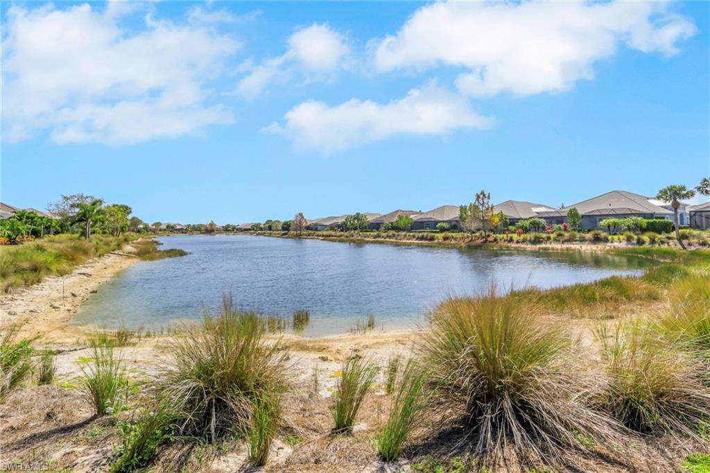 5752 Elbow Avenue Naples, FL 34113 - Photo 27 of 38 Water view with nearby suburban area