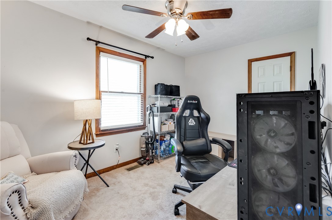 445 Poplar Road Aylett, VA 23009 - Photo 20 of 36 a view of a workspace with furniture and a window