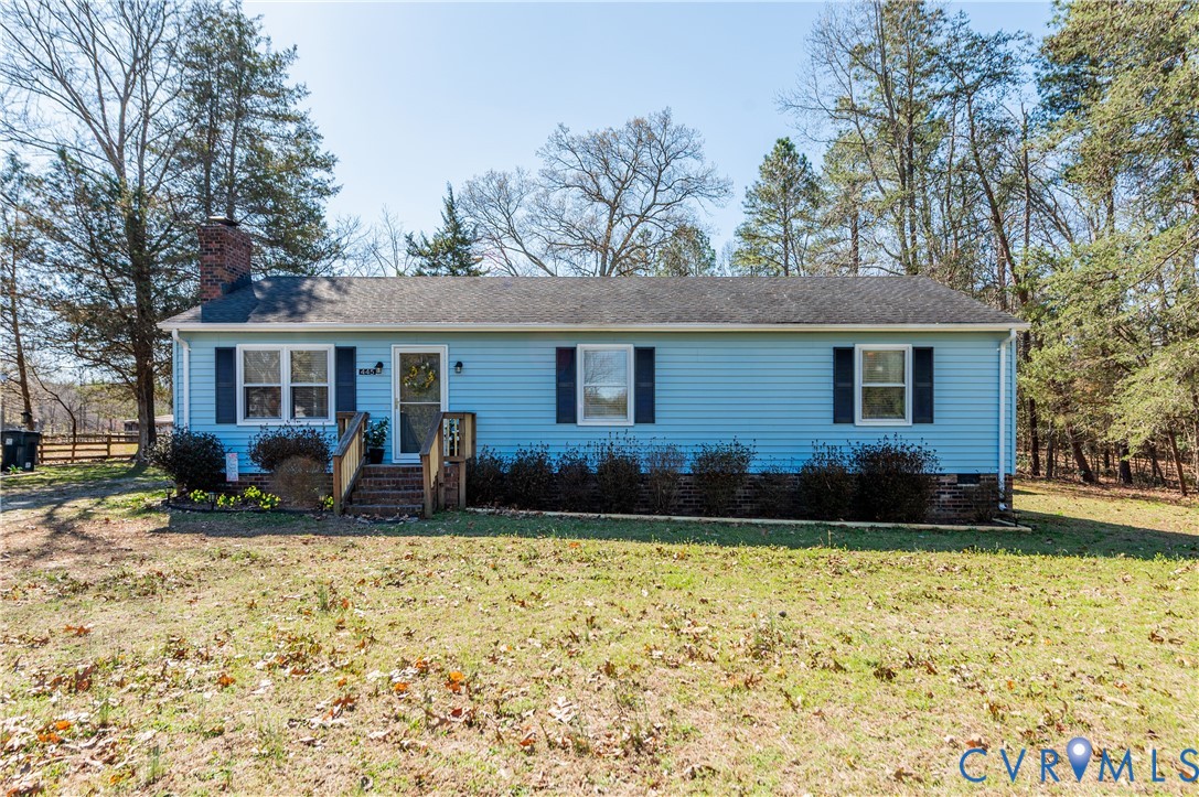 445 Poplar Road Aylett, VA 23009 - Photo 2 of 36 a front view of house with yard and trees around