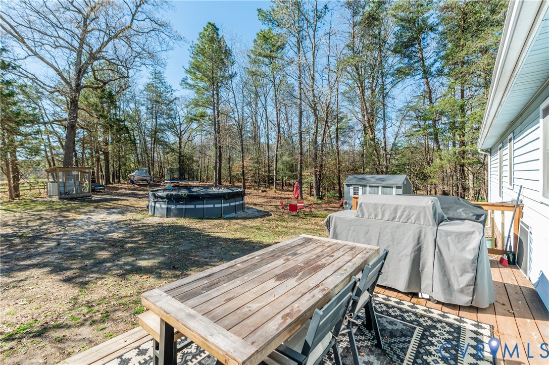 445 Poplar Road Aylett, VA 23009 - Photo 28 of 36 a view of a wooden deck and chairs