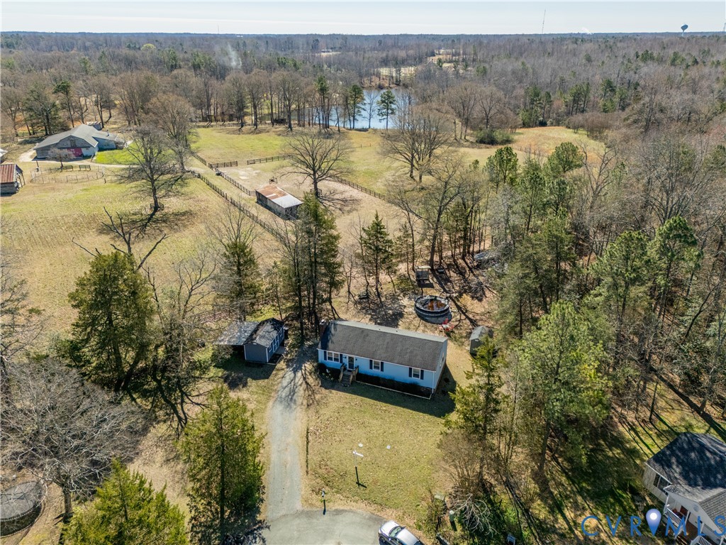 445 Poplar Road Aylett, VA 23009 - Photo 30 of 36 a view of a lake with houses