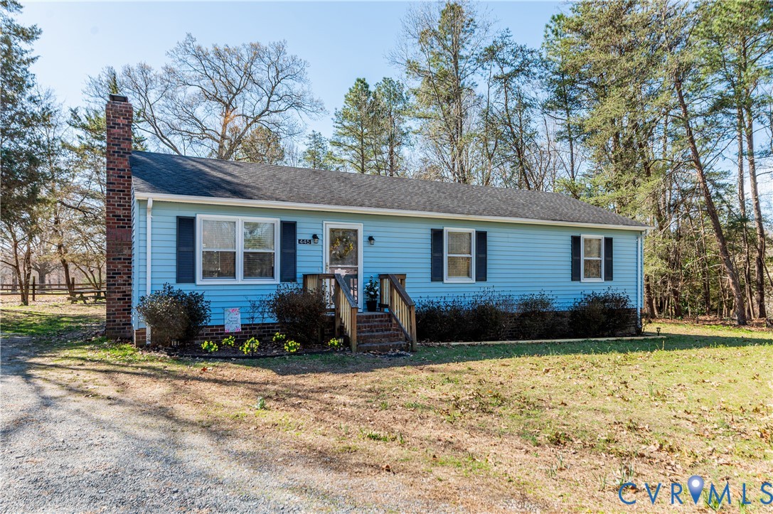 445 Poplar Road Aylett, VA 23009 - Photo 3 of 36 a front view of a house with a yard