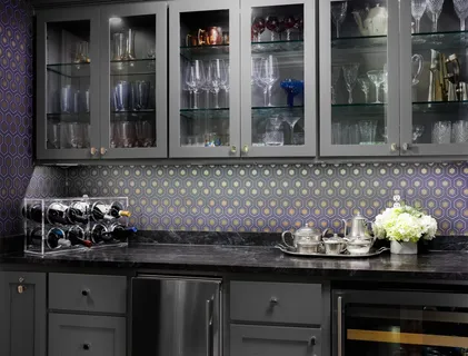 a kitchen with a sink and cabinets