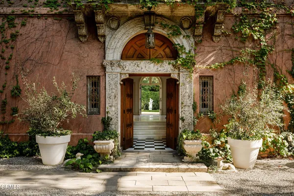 a front view of house with outdoor space
