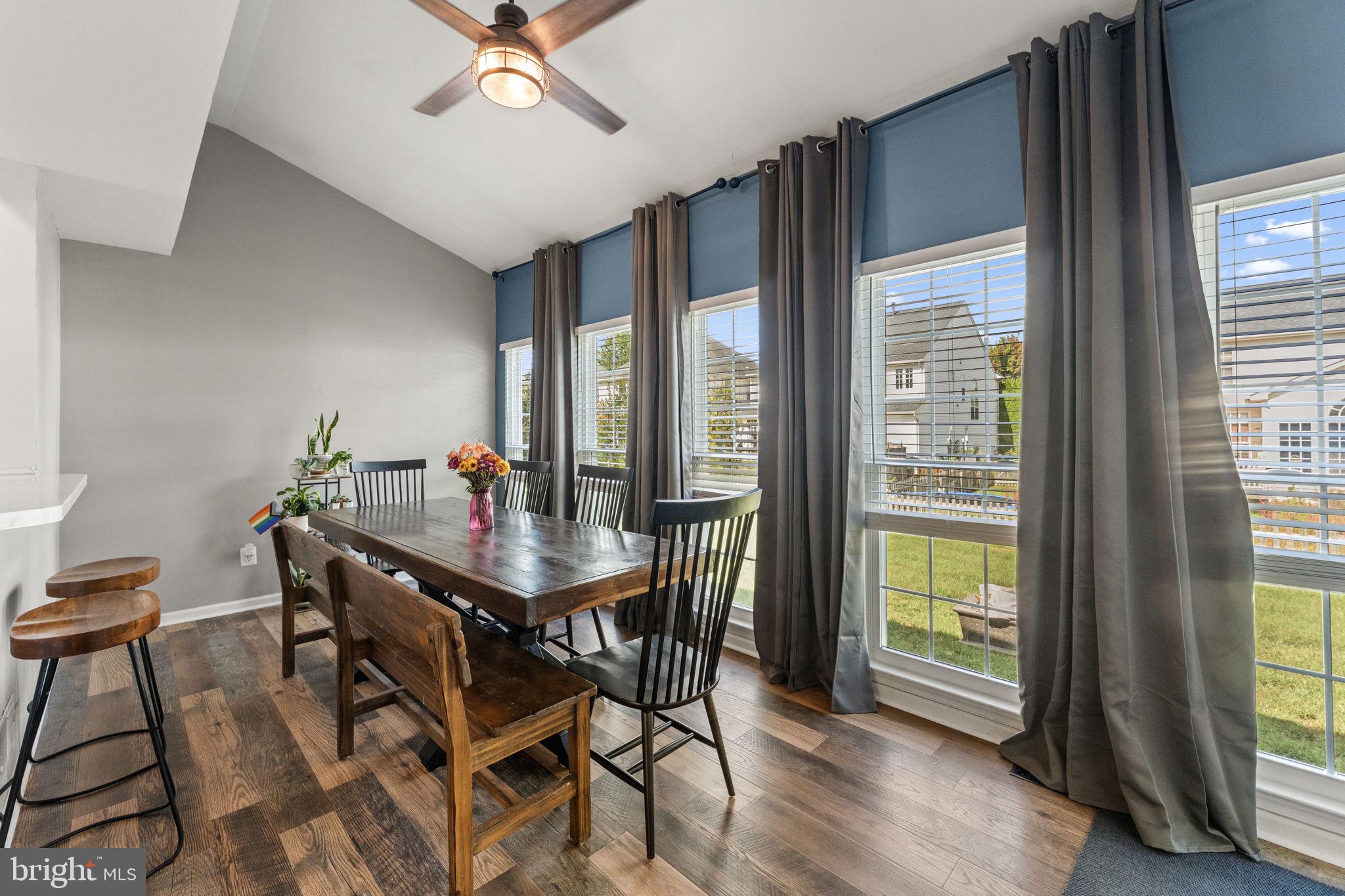 5219 Joshua Tree Circle Fredericksburg, VA 22407 - Photo 1 of 42 a view of a dining room with furniture window and wooden floor