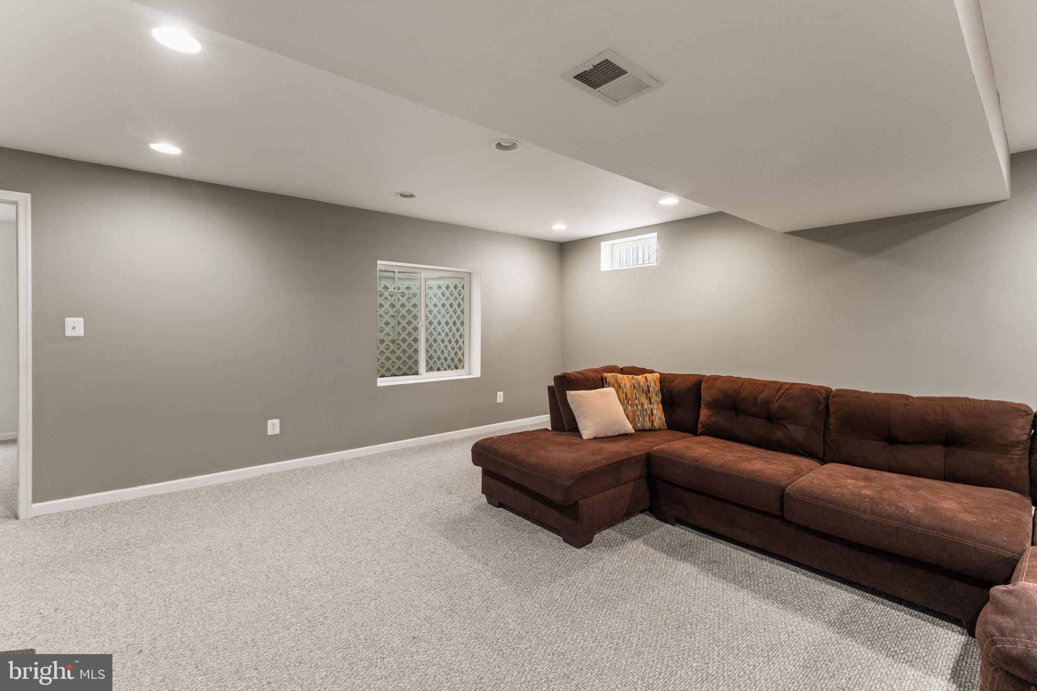 5219 Joshua Tree Circle Fredericksburg, VA 22407 - Photo 32 of 42 a living room with furniture and a window