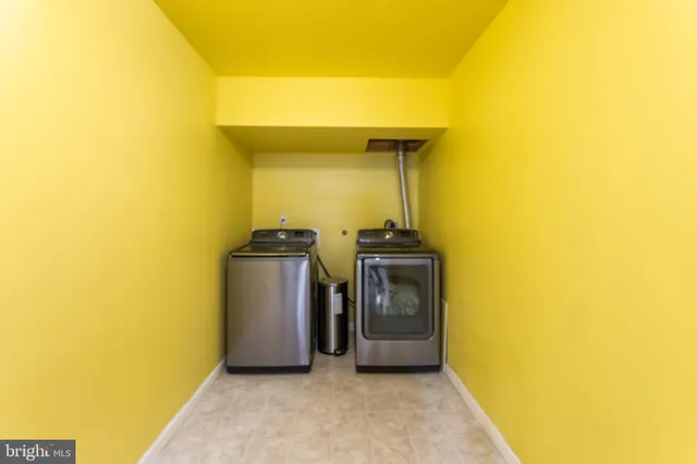 a view of a storage & utility room with a sink