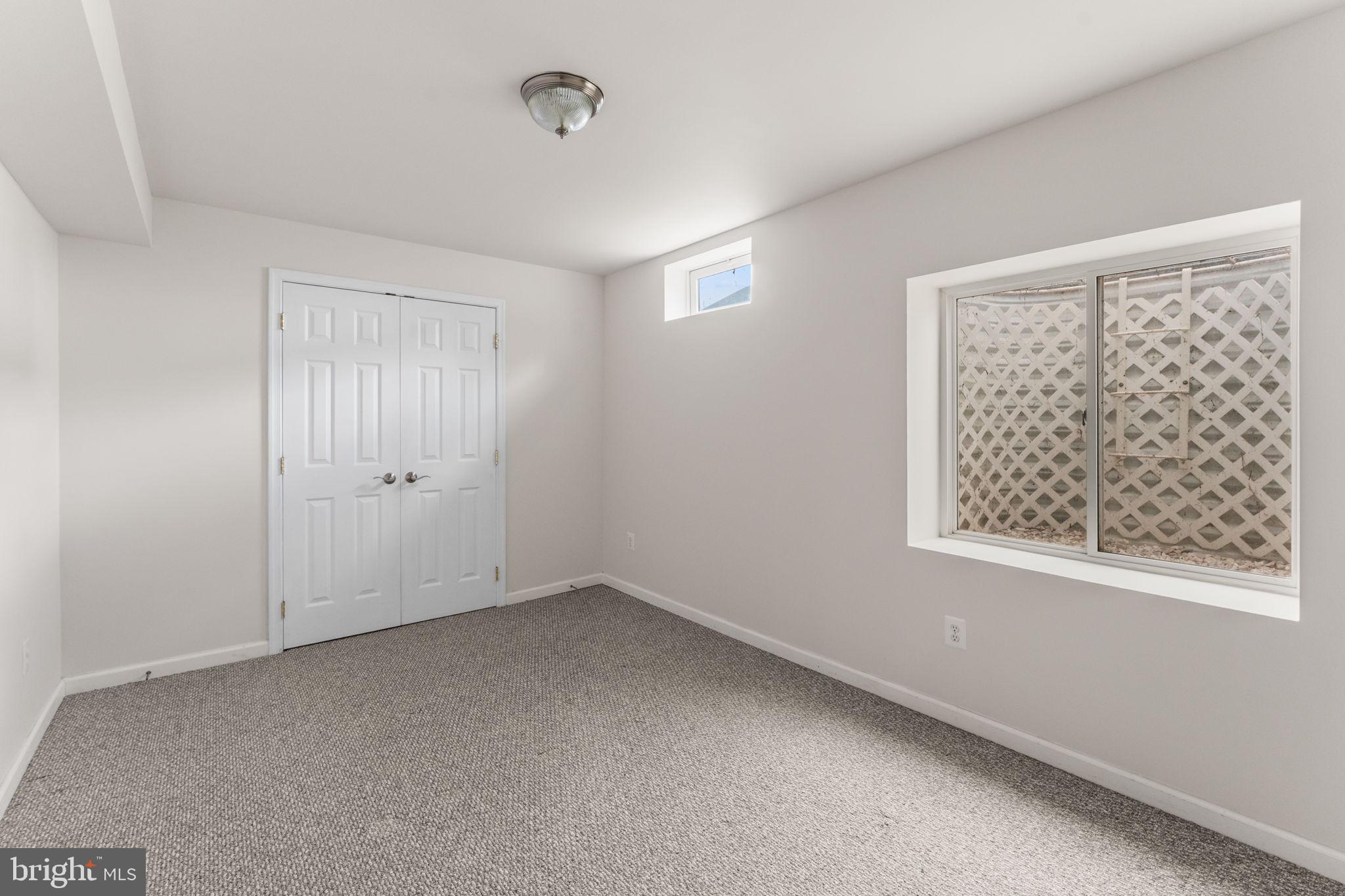 5219 Joshua Tree Circle Fredericksburg, VA 22407 - Photo 35 of 42 a view of an empty room with a window