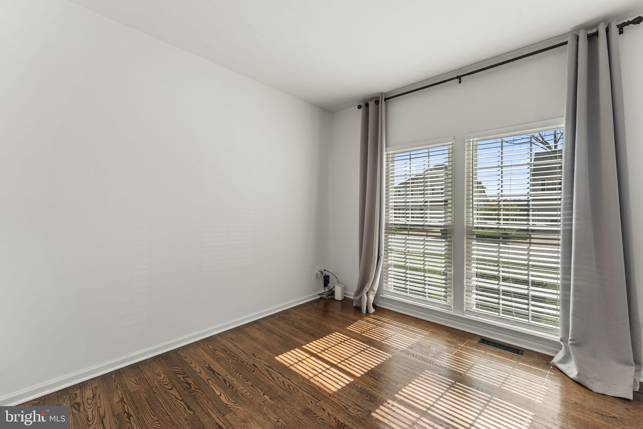 5219 Joshua Tree Circle Fredericksburg, VA 22407 - Photo 6 of 42 a view of an empty room with a window