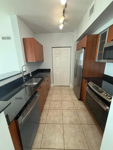 a view of balcony with furniture