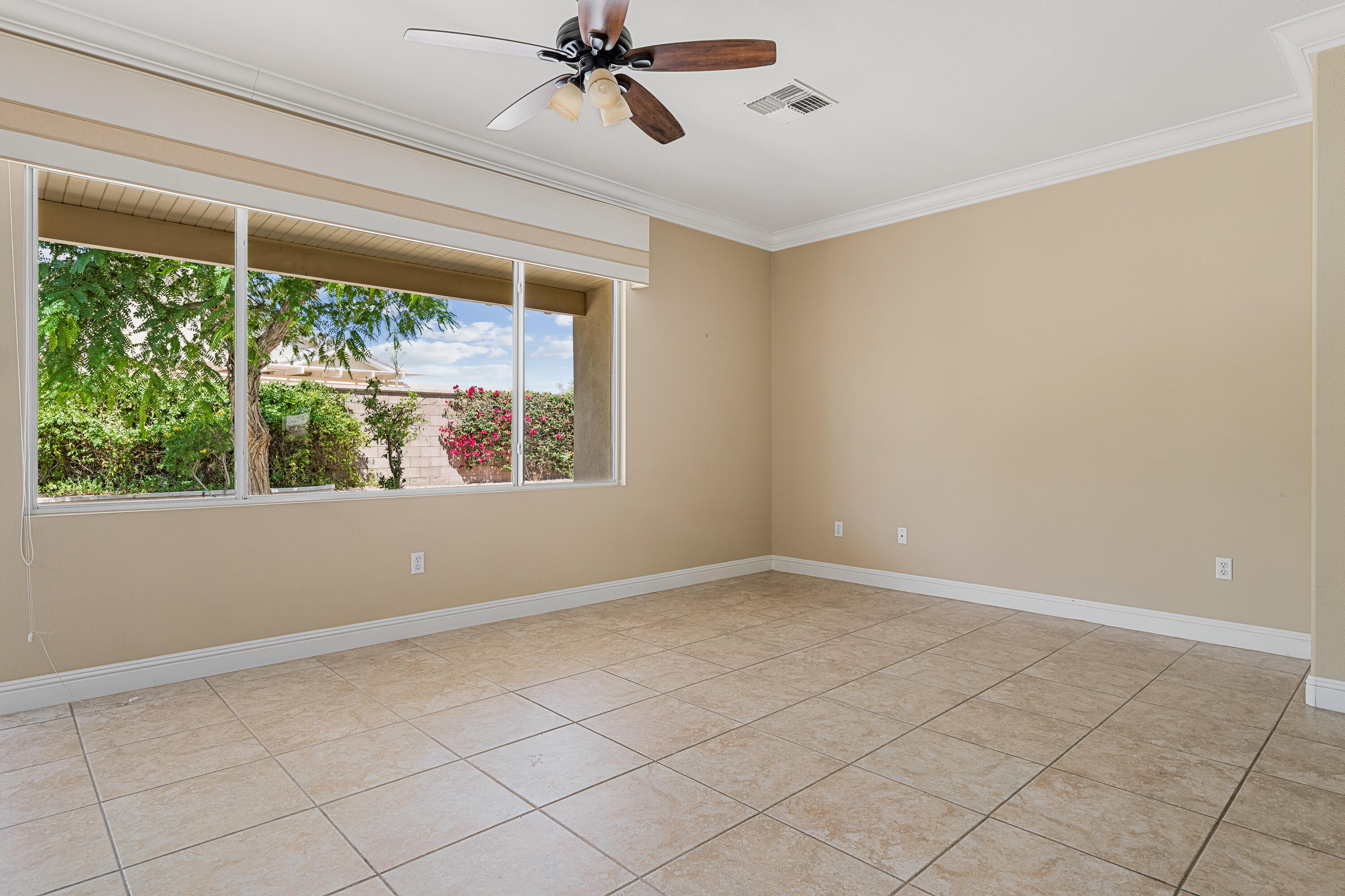 36403 Monarch Pass Palm Desert, CA 92211 - Photo 12 of 32 a view of an empty room with a window